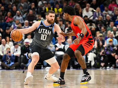 Українці за кордоном: Михайлюк набрав 14 очок в матчі НБА